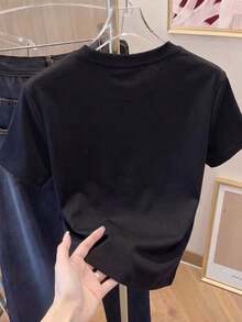 Envío gratis, entrega local enéxico, entrega en 4 días. Camiseta casual estampada para mujer, manga corta y cuello redondo, moda urbana local de primavera/verano. - Negro - Ver 4