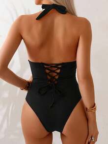 Traje de baño de una pieza con control de abdomen, estilo minimalista de unicolor, con escote halter y espalda descubierta, para vacaciones de verano en la playa - Negro - Ver 7