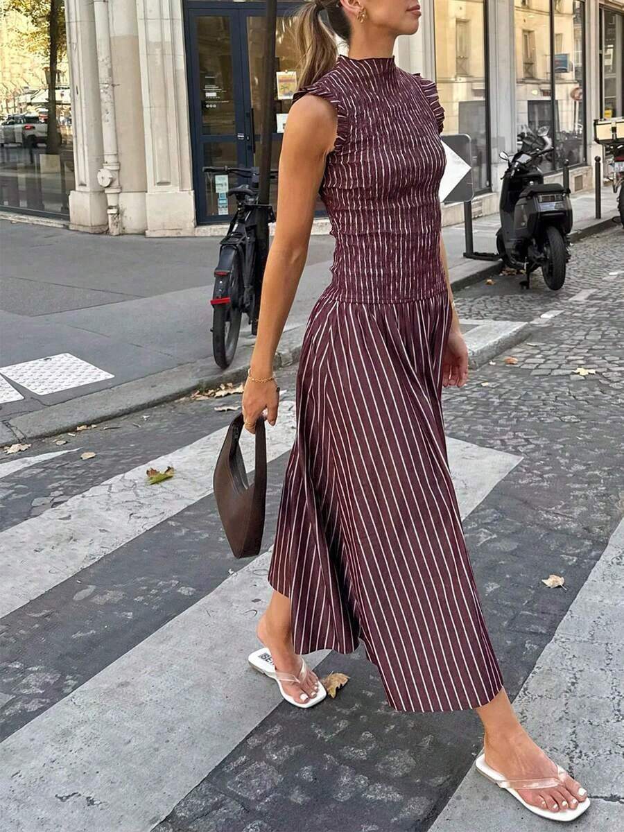 Moda primavera/verano 2026: Un vestido largo versátil adecuado para uso diario, ocasiones casuales, trayecto al trabajo y estilo callejero. Sensual, elegante y con aire de dama madura con diseño de volantes en el bajo, creando una atmósfera de resort de playa. - Morado - Ver 1