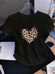 Women's Slim Waist Leopard Heart Print T-Shirt, Short Sleeve, Round Neck, Stretchy Top, Fashion Tee, Soft And Breathable, Women's Clothing, Outdoor T-Shirt, Vacation, Graduation, Fitted, Slogan T-Shirt, Quote T-Shirt, Minimalist Graphic T-Shirt, Funny Graphic T-Shirt, Beach Party, Surfing, Picnic, Gift, Airport Outfit, Spring, Women's Summer Outfits, Modest Summer Dresses, Summer Dresses, Formal Dresses, Fall, Winter, All Seasons, Birthday Dress, Party Dresses, Rave Outfits, Office Wear For Women, Curvy, Women's Casual Dresses, Women's Gym Clothes, Resort Style, Classic Unisex Graphic T-Shirt. TFXZ - Black - View 1