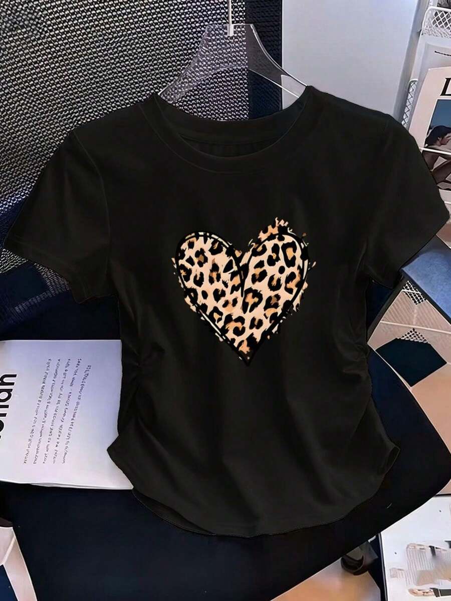 Women's Slim Waist Leopard Heart Print T-Shirt, Short Sleeve, Round Neck, Stretchy Top, Fashion Tee, Soft And Breathable, Women's Clothing, Outdoor T-Shirt, Vacation, Graduation, Fitted, Slogan T-Shirt, Quote T-Shirt, Minimalist Graphic T-Shirt, Funny Graphic T-Shirt, Beach Party, Surfing, Picnic, Gift, Airport Outfit, Spring, Women's Summer Outfits, Modest Summer Dresses, Summer Dresses, Formal Dresses, Fall, Winter, All Seasons, Birthday Dress, Party Dresses, Rave Outfits, Office Wear For Women, Curvy, Women's Casual Dresses, Women's Gym Clothes, Resort Style, Classic Unisex Graphic T-Shirt. TFXZ - Black - View 1
