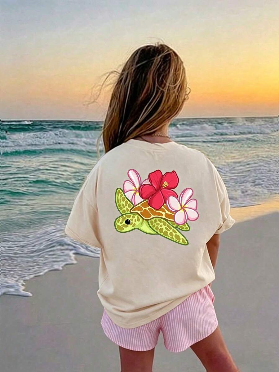 Camiseta de manga corta holgada con cuello redondo con estampado de hibisco y tortuga marina para niñas, uso casual diario y de playa - Albaricoque - Ver 1