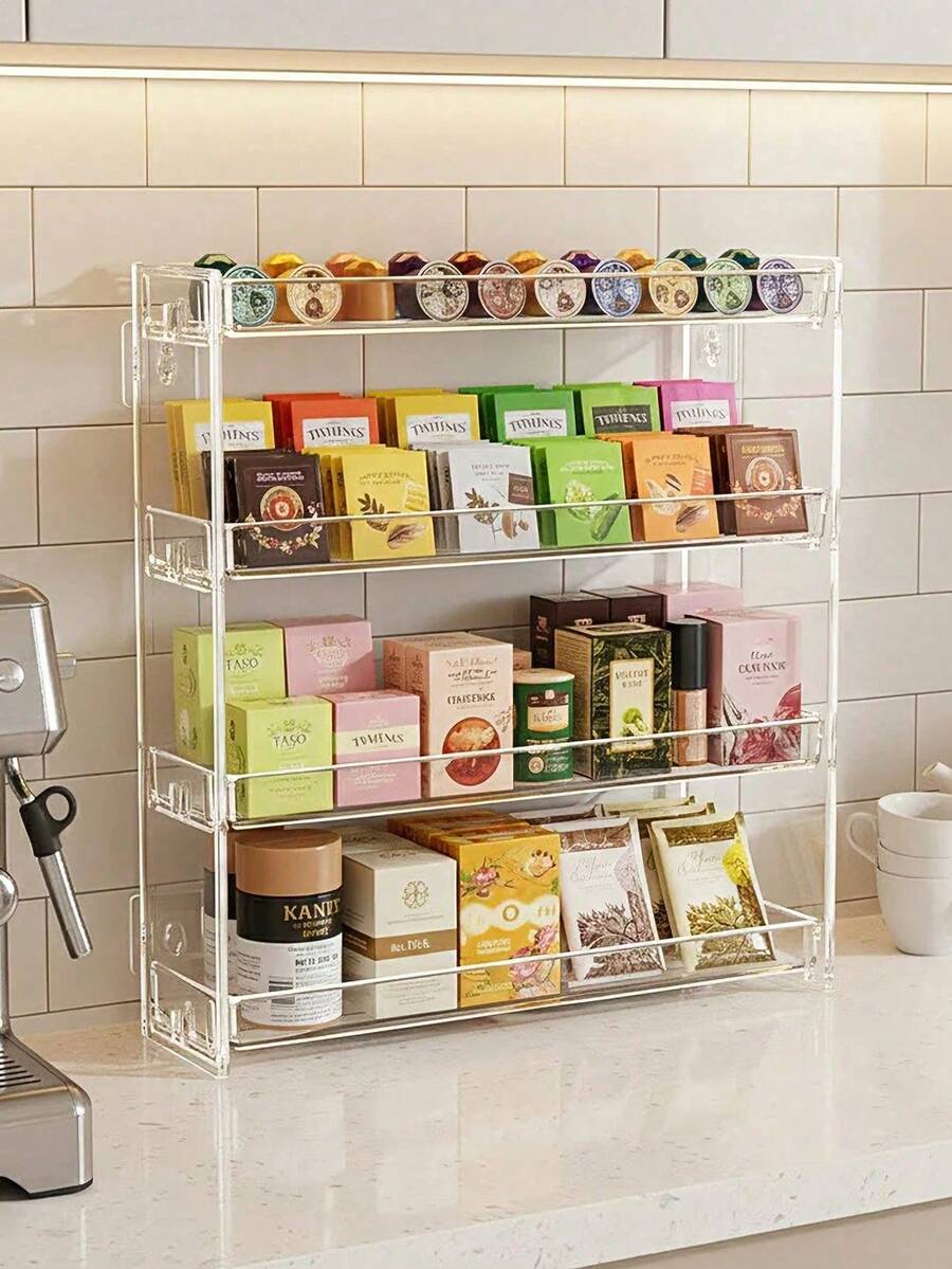 1 chiếc kệ đựng túi trà/viên cà phê bằng acrylic trong suốt 4 tầng, kiểu dáng tối giản, chất liệu acrylic trong suốt cao cấp, thiết kế nhiều tầng hình chữ nhật, kệ lưu trữ và trưng bày túi trà/viên cà phê, tiết kiệm không gian mặt bàn.