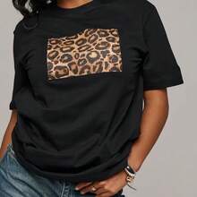 Camiseta de verano con estampado de leopardo estilo americano, estilo europeo y americano, adelgazante, versátil, de cuello redondo, manga corta, de algodón puro, top a la moda. - Negro - Ver 1
