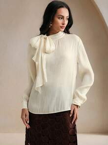 Blusa elegante y chic de cuello alto, manga larga y puños con lazo para uso diario - Albaricoque - Ver 6