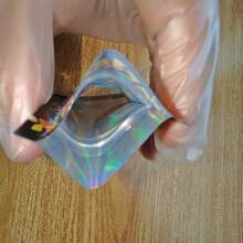 100个3D激光全息防异味铝箔袋，带自封拉链 – 7*9厘米可重复密封1克食品储存袋，适用于糖果、甜点、软糖、巧克力 | 混合彩色图案，防异味袋，可重复使用塑料包装袋 - 彩色 - 查看 3