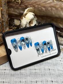 Conjunto de 10 adesivos de unhas artesanais em formato amendoado com borboletas e olhos de gato azuis. Design sofisticado, perfeito para meninas e mulheres usarem na praia no verão. Unhas postiças removíveis e reutilizáveis. - Multicolorido - Ver 2