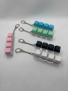 1 pieza Llavero con teclado fidget - Ajustes de clic silencioso y ruidoso para oficina, biblioteca y alivio de la ansiedad | Juguete antiestrés de diseño alegre con colores variados - color - Ver 8