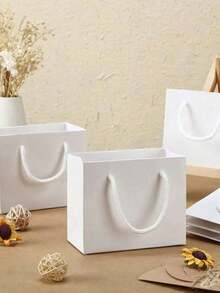 10 chiếc túi quà mini màu trắng có quai xách, túi đựng thiệp chúc mừng, hộp quà giấy nhỏ dùng trong các bữa tiệc, thích hợp cho Ngày của Mẹ, đám cưới, tiệc mừng em bé, sinh nhật, kích thước: 4.7 x 3.9 x 2.3 inch - trắng - Xem 4