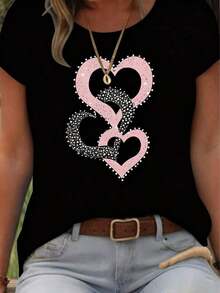 Camiseta de manga corta con cuello redondo para mujer, corte holgado, casual y versátil.Con un estampado de corazones en forma de lazo moderno, elegante y sofisticado, es perfecta como prenda básica; hecha de tela suave con excelente caída. - Negro - Ver 7