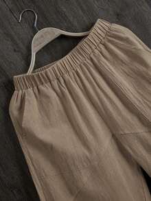 LUMIGAL Pantalones casuales sueltos de cintura elástica para mujer con forma cónica y bolsillos de unicolor - Caqui - Ver 4