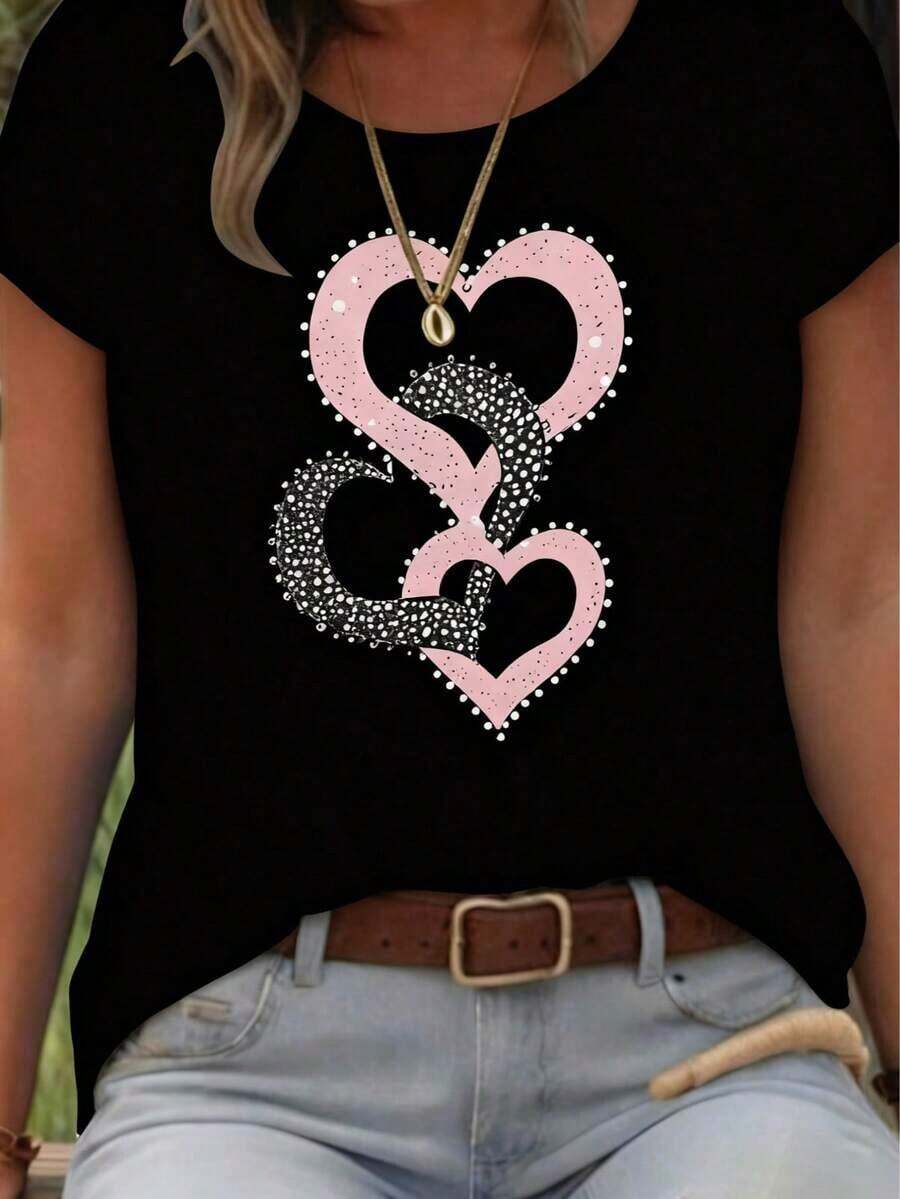 Camiseta de manga corta con cuello redondo para mujer, corte holgado, casual y versátil.Con un estampado de corazones en forma de lazo moderno, elegante y sofisticado, es perfecta como prenda básica; hecha de tela suave con excelente caída. - Negro - Ver 1