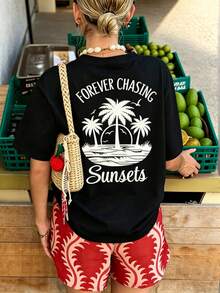 Camiseta de manga corta con cuello redondo y estampado gráfico de palmeras y atardeceres para mujer, azul, adecuada para uso casual, al aire libre, vacaciones, todas las estaciones, verano. - Negro - Ver 1