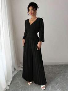 Mono elegante de pierna ancha con escote cruzado en V, mangas tipo murciélago y pliegues, en color liso para mujer - Negro - Ver 6
