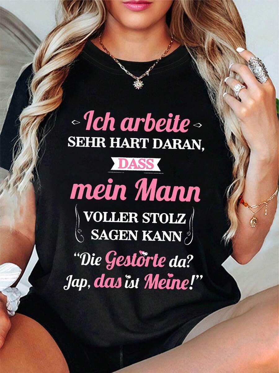 Camiseta de manga corta de punto negro con cuello redondo y estampado de eslogan alemán para mujer, estilo casual.