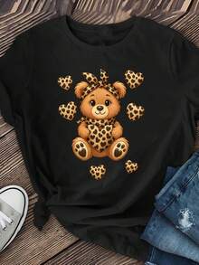 Camiseta de manga corta con estampado de leopardo y diseño de corazón y oso para mujer - Top casual de cuello redondo, suave y elástico para primavera, verano y otoño, lavable a máquina, camiseta con diseño de animales adorables, moda de primavera, estilo pullover, ropa de temporada, ajuste cómodo, camiseta estampada, para amantes de la moda. - Negro - Ver 1