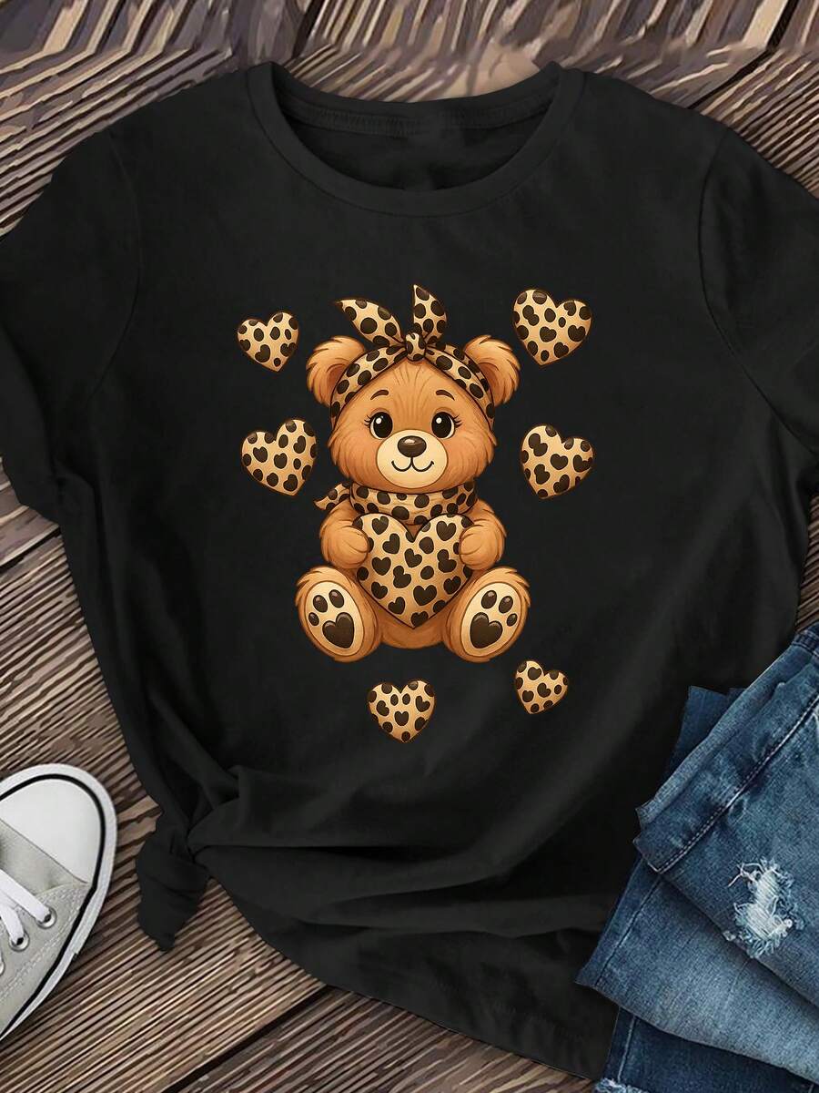 Camiseta de manga corta con estampado de leopardo y diseño de corazón y oso para mujer - Top casual de cuello redondo, suave y elástico para primavera, verano y otoño, lavable a máquina, camiseta con diseño de animales adorables, moda de primavera, estilo pullover, ropa de temporada, ajuste cómodo, camiseta estampada, para amantes de la moda. - Negro - Ver 1