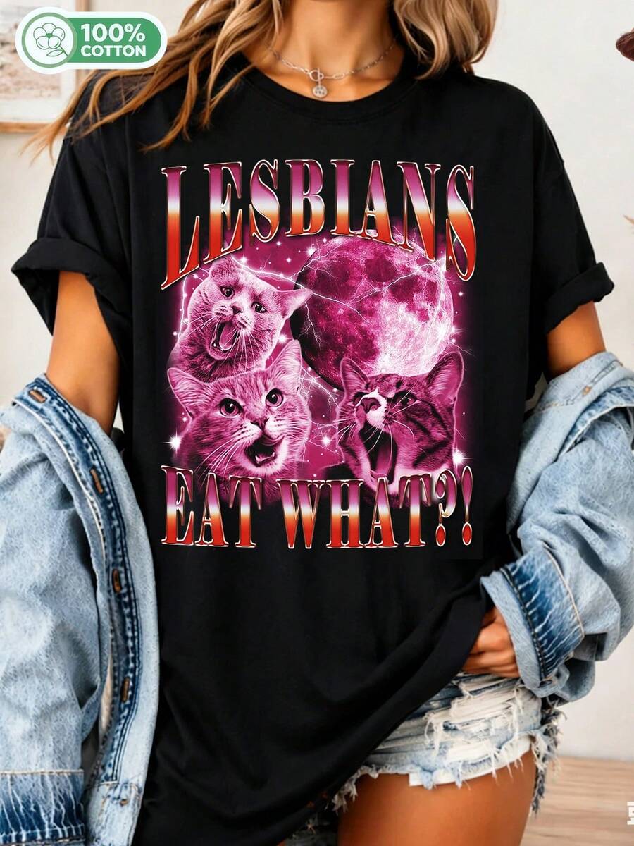 "What Do Lesbians Eat?" T-Shirt, Funny Cat T-Shirt, Pride T-Shirt, Lesbian T-Shirt, LGBTQ+ T-Shirt, Meme T-Shirt, Lesbian T-Shirt, Pride Month T-Shirt, Vintage T-Shirt - Black - View 1