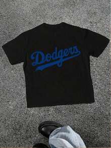 100% cotton Emblema de los Dodgers en azul intenso que celebra la herencia atemporal del béisbol y el orgullo del equipo con un atractivo urbano y relajado.Camiseta casual para mujer. - Negro - Ver 7
