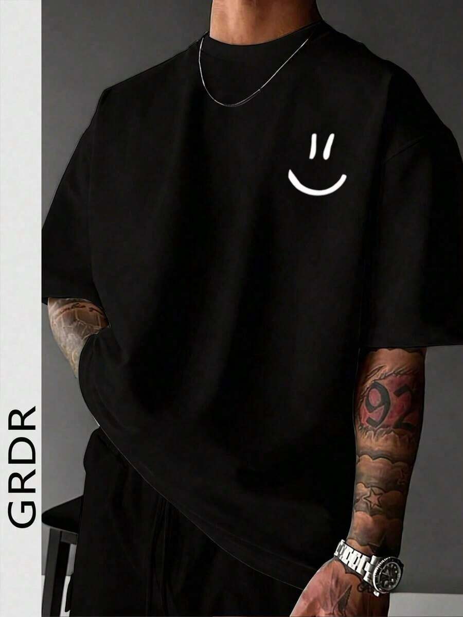 Camiseta Casual de Verano para Hombre con Estampado Gráfico de Cara Sonriente, Cuello Redondo, Manga Corta, Cómoda y Elegante, Adecuada para Uso Casual, Salidas, Reuniones y Otras Ocasiones. - Negro - Ver 1