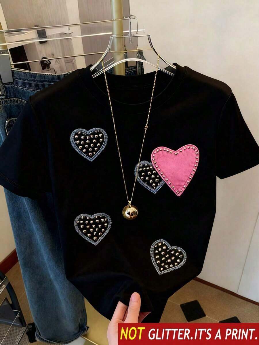 Camiseta básica de manga corta para mujer Otoño/Invierno 2025: cuello redondo, corte holgado, estampado de corazones de moda, tejido suave con caída impecable y ultra combinable - Negro 3 - Ver 1