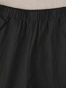 Pantalones casuales de mujer con decoración de botones y bolsillos en diagonal - Negro - Ver 5