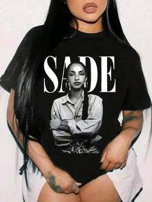1 camiseta con estampado de imagen Sade.Imprescindible para los amantes de la música.Ropa de verano.Se puede usar como capa interior o exterior.Top de talla grande.Adecuado para compras deportivas o ocio en casa.180g 100% algodón. - Negro - Ver 6