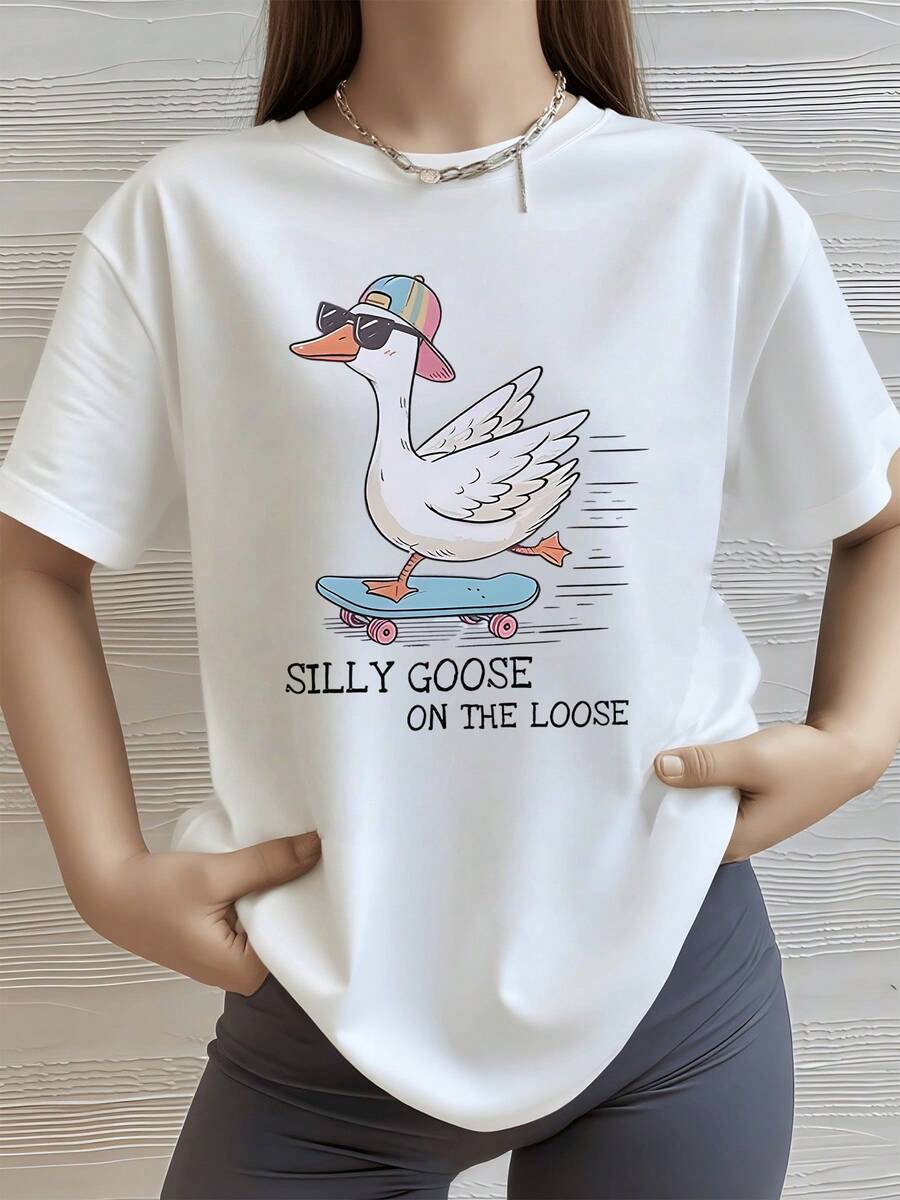 Ganso divertido con gafas y gorra multicolor montando una patineta que transmite energía y humor juvenil ideal para días relajados camiseta de mujer casual moderna y cómoda para uso diario - Blanco - Ver 1