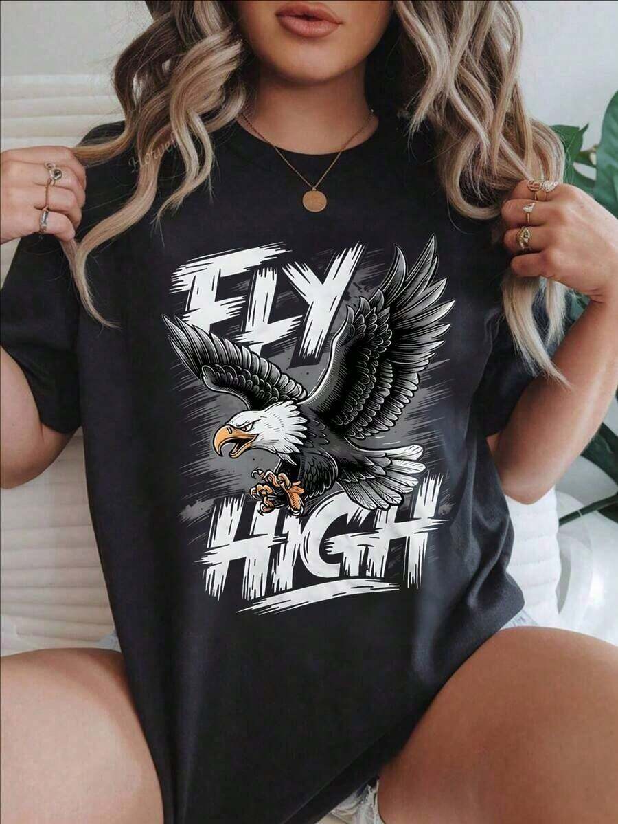 Camiseta Casual para Mujer - Camiseta de Manga Corta con Diseño Gráfico de Águila 'Fly High', Cuello Redondo, Top de Verano, Lavable a Máquina, Camisetas para Damas, Ropa Casual, Estilo Moderno, Ajuste Cómodo
Negro100% AlgodónDuradero - Negro - Ver 1