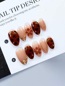Bộ 10 miếng, làm thủ công 100%, mỗi miếng đều được làm thủ công với nhiệt độ khác nhau, chênh lệch nhỏ tạo nên sự độc đáo. Bộ móng giả hình hạnh nhân ngắn, được làm thủ công hoàn toàn, kiểu dáng thanh lịch và tinh tế, nghệ thuật làm móng ngọt ngào cho bé gái, thiết kế hình hạnh nhân, móng giả làm trắng, móng giả acrylic tái sử dụng được làm thủ công hoàn toàn, kèm theo 1 dũa móng mini và 1 nhãn dán tự dính. - Nhiều màu - Xem 1