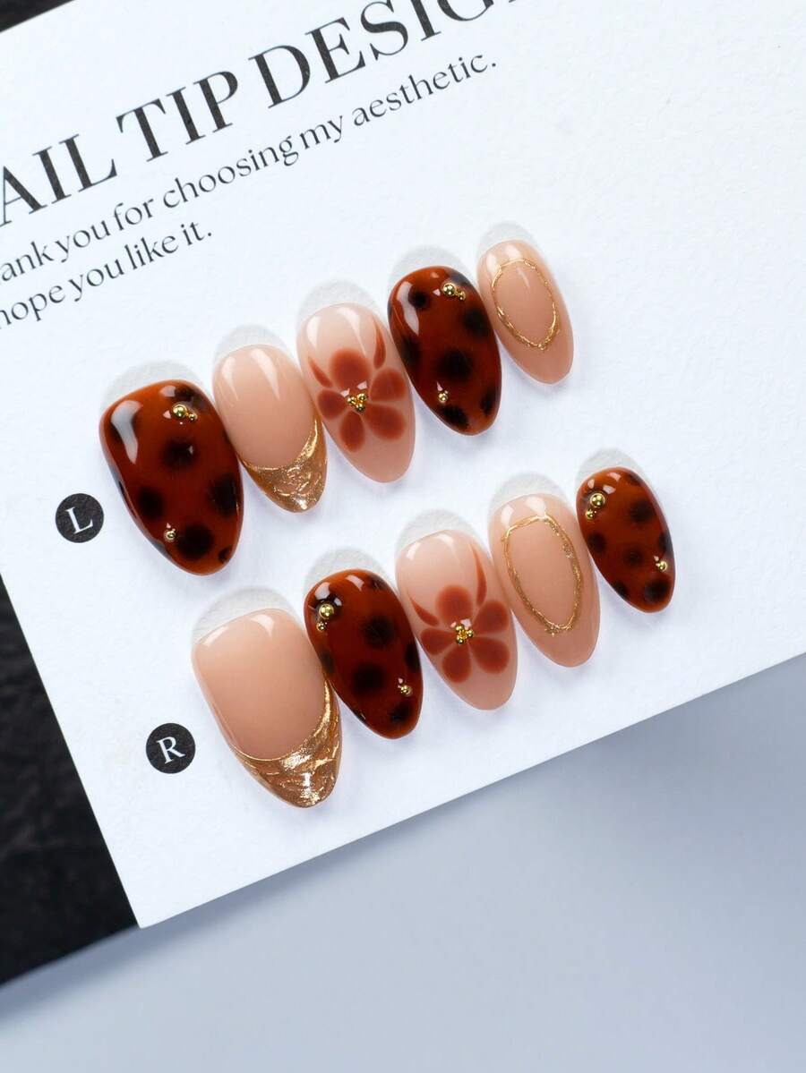 Bộ 10 miếng, làm thủ công 100%, mỗi miếng đều được làm thủ công với nhiệt độ khác nhau, chênh lệch nhỏ tạo nên sự độc đáo. Bộ móng giả hình hạnh nhân ngắn, được làm thủ công hoàn toàn, kiểu dáng thanh lịch và tinh tế, nghệ thuật làm móng ngọt ngào cho bé gái, thiết kế hình hạnh nhân, móng giả làm trắng, móng giả acrylic tái sử dụng được làm thủ công hoàn toàn, kèm theo 1 dũa móng mini và 1 nhãn dán tự dính. - Nhiều màu - Xem 1