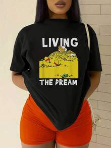 Pattern Showing A Cute Duck Resting On A Mountain Of Gold Coins Symbolizing Success And Abundance. Comfortable, Modern, Casual Women's Short-Sleeved T-Shirt Ideal For Everyday Wear. - 黑色 - 查看 2