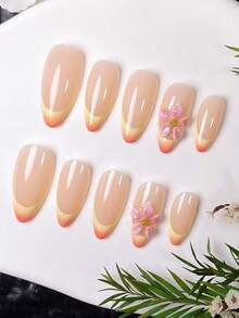 Bộ 10 móng giả thủ công hình hạnh nhân, kiểu chạm khắc hoàng hôn. Với lớp nền màu nude nhẹ nhàng, những móng giả này được thiết kế với các đường kẻ Pháp màu vàng vẽ tay và hiệu ứng chuyển màu cam, kết hợp với các họa tiết chạm khắc chuyển màu hồng thủ công. - Nhiều màu - Xem 3