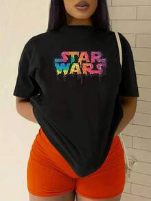 Colorful Graphic With Letters That Appear To Melt, Symbolizing Creative Energy And A Bold Attitude. Comfortable, Modern Women's T-Shirts Ideal For Everyday Wear Or Paired With Jeans For An Attractive Casual Look. - 黑色 - 查看 2