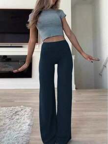Estos pantalones anchos de yoga de unicolor son cómodos y estilizadores, adecuados para correr, hacer ejercicio y diversas actividades de yoga.Primavera - Azul marino - Ver 10