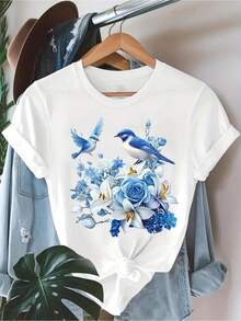 Camiseta de manga corta para mujer en azul claro y azul cielo - Blusa casual de cuello redondo con estampado floral de aves en azul, adecuada para atu - Blanco - Ver 2