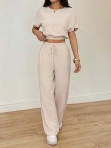 Conjunto de dos piezas con top corto de manga murciélago y pantalones con cordón en la cintura, de tela texturizada.Conjunto de dos piezas casual, cómodo y para tallas altas para mujeres. - Albaricoque - Ver 3