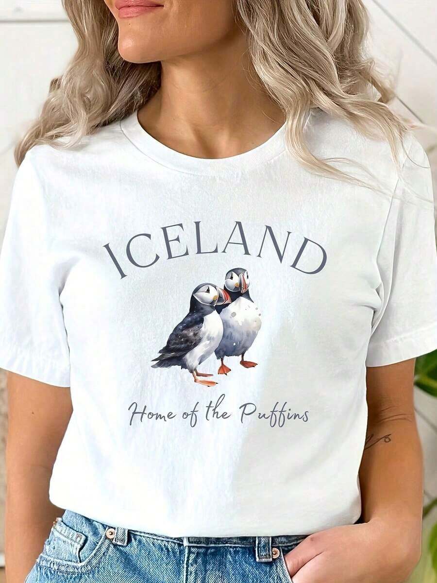 Modern Minimalist Short-Sleeved T-Shirt With Round Neck And Penguin Print For Casual Everyday Wear. - White - View 1