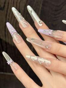 Bộ 10 móng tay giả nhọn thủ công, kiểu nơ ren gió dễ thương cho bé gái, họa tiết hoa xanh dương vẽ tay, màu hồng ma thuật với hình bướm xanh, màu hồng vàng tương phản với hình heo 3D, thích hợp cho các bữa tiệc và sử dụng hàng ngày. Thích hợp cho các bé gái và phụ nữ tham dự các lễ hội, tiệc tùng, lễ hội âm nhạc và sử dụng hàng ngày, quà tặng Ngày Valentine và Ngày của Mẹ. - Màu Lilac Tím - Xem 3