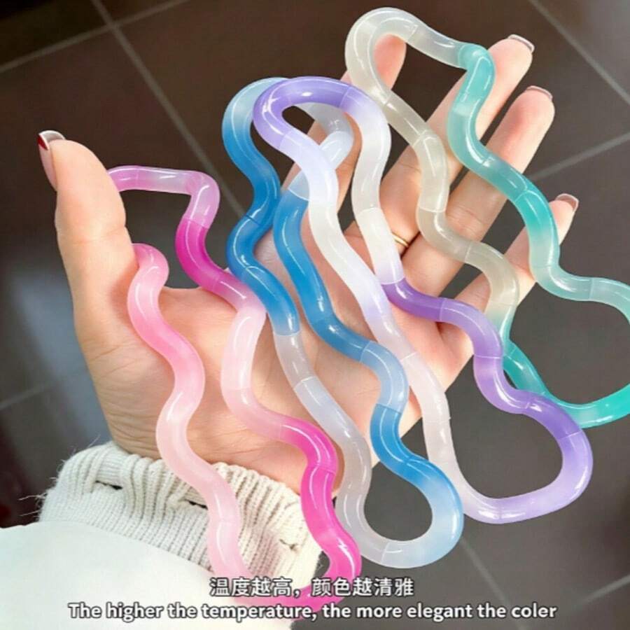 1 chiếc dụng cụ tập luyện giảm áp lực ngón tay bằng kim loại mạ điện cầu vồng, đồ chơi bóp chậm đàn hồi nhiều màu sắc, dụng cụ tập luyện tay giúp người lớn giảm căng thẳng và lo âu, thích hợp để giảm stress văn phòng/làm bạn đồng hành trong học tập/quản lý thói quen/đồ chơi thư giãn trên bàn làm việc.