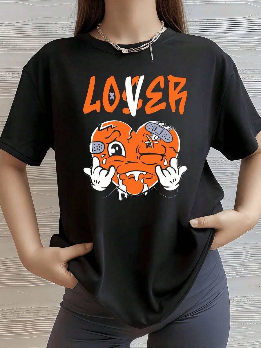Corazón roto con vendas y gesto rebelde que expresa fuerza después del dolor y pasión por superar los desafíos camiseta de mujer casual moderna cómoda para uso diario - Negro - Ver 1
