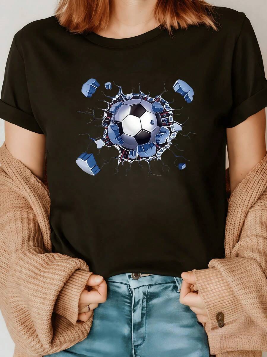 A Soccer Ball Breaking Through A Wall Symbolizes Energy, Strength, And Sporting Passion. With A Dynamic Motion Effect And Realistic Details, This Women's Casual, Modern, And Comfortable T-Shirt Is Perfect For Everyday Wear. - 黑色 - 查看 1