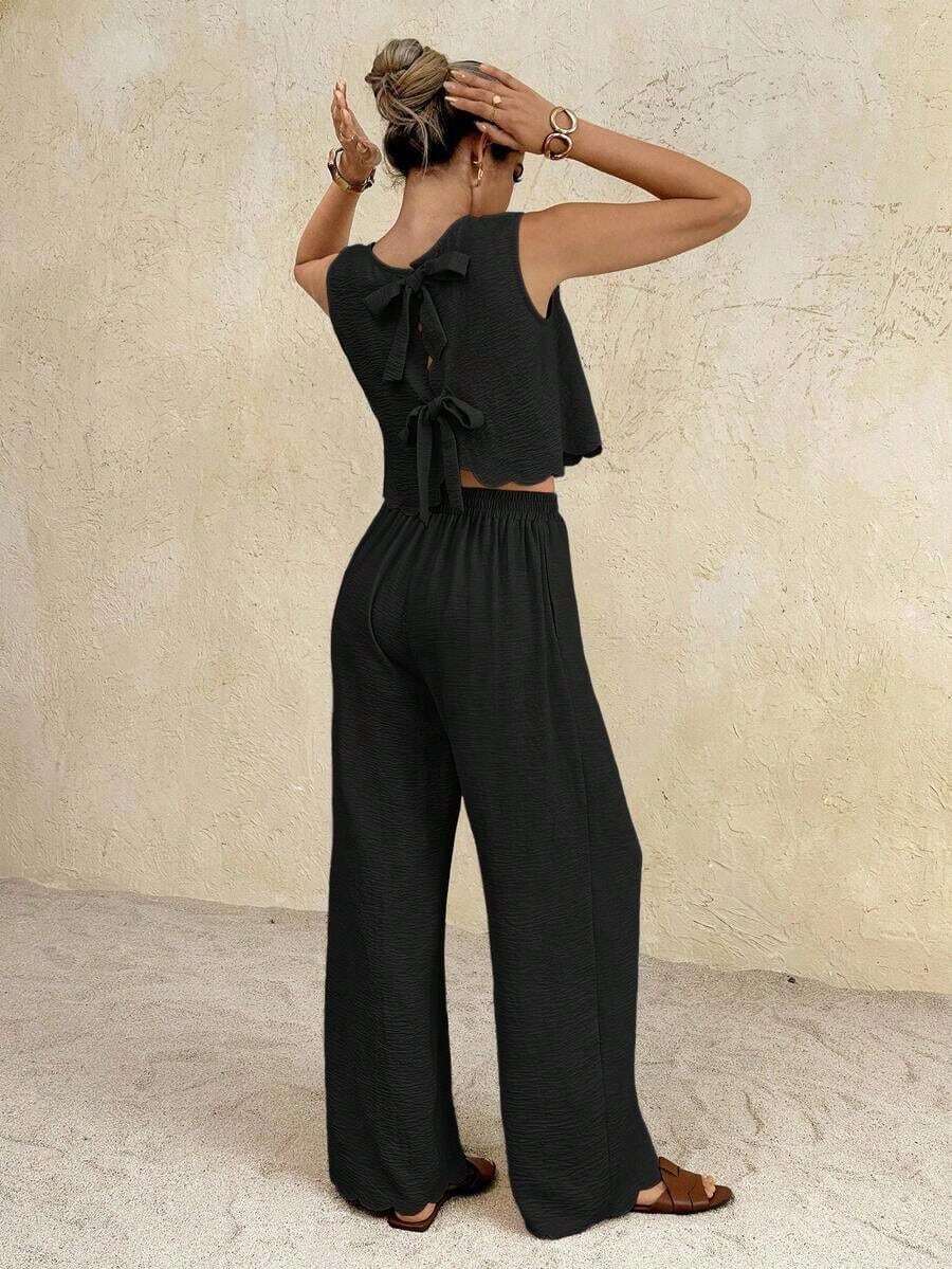 Conjunto informal de 2 piezas con top de cuello redondo y lazo en la espalda, y pantalones de cintura elástica de unicolor para mujer - Negro - Ver 1