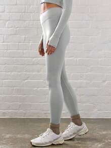 Sport Leggings ajustados de cintura contorneada y cruzada para actividades, pádel, tenis, pickleball, gimnasio, fitness, pilates y uso casual diario - Gris Claro - Ver 2