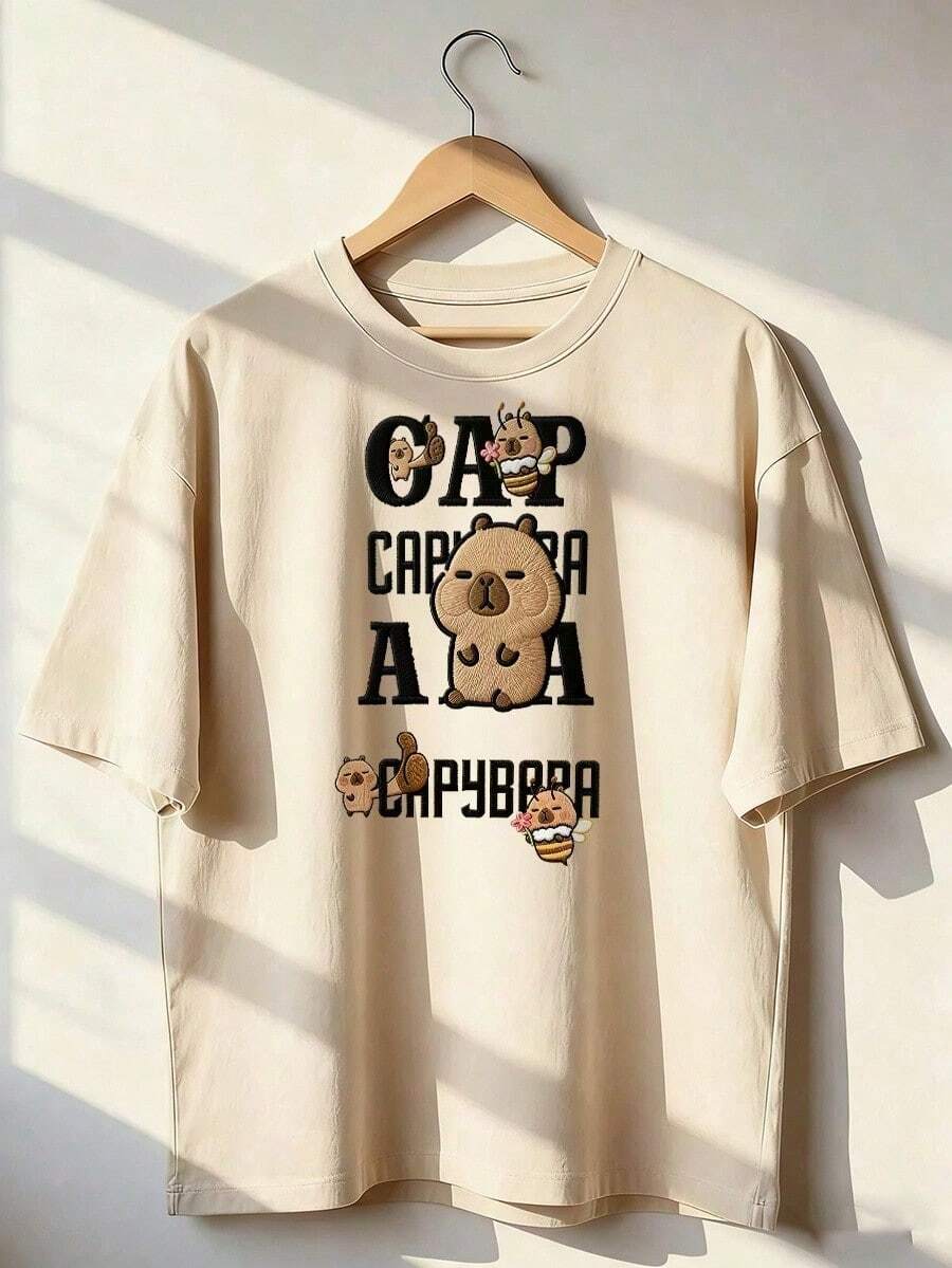Camiseta con Capybaras Lindas y Texto "Capybara",Camiseta de manga corta de moda para primavera y verano de 2026, hecha en México, 180 gramos. Estampado de dibujos animados, modelo de pareja, apta para uso interior o exterior. Cuello redondo, unisex, ideal para oficina y ocio. Paquete de una pieza. - APR-P631577SLNDXZGY355 - Ver 1