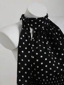 Blusa con cuello de halter, espalda descubierta, cintura ceñida y bajo asimétrico con lunares en blanco y negro.Elegante para ir al trabajo, vacaciones, playa, casual, citas.Versátil para mujeres en verano - Negro - Ver 4