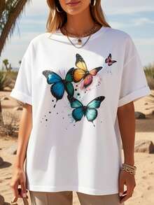 Camiseta Oversize para Mujer - Estampado Azul Turquesa y Rosa, Manga Corta, Cuello Redondo, 100% Ajuste Holgado, Camisa Casual con Base Blanca y Mariposas Multicolor, Ropa Lavable a Máquina para Todas las Temporadas - Estilo Urbano Vintage, Camiseta Unisex de Algodón Holgada de Manga Corta y Cuello Redondo. - Blanco - Ver 2