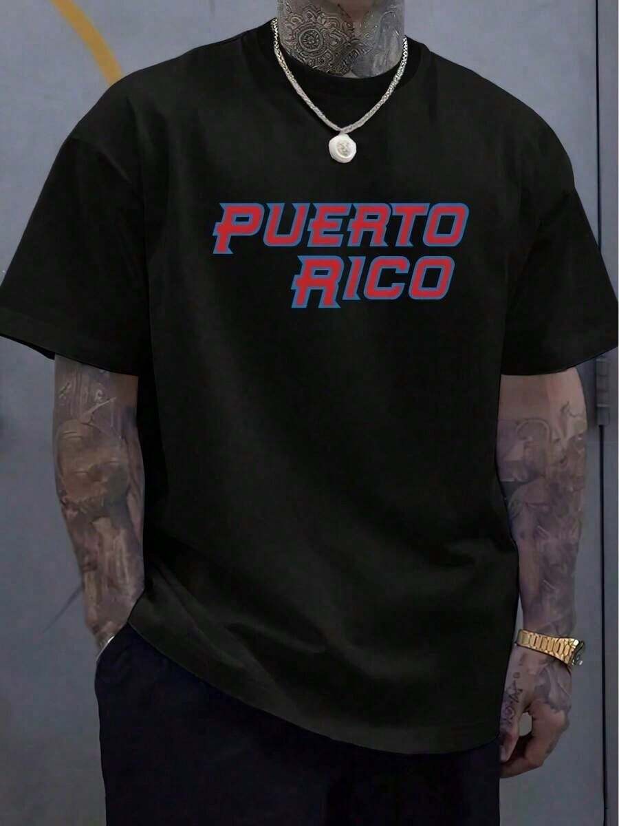 Con un acabado vintage desgastado, esta camiseta casual para hombre presenta un diseño artístico inspirado en Puerto Rico en rojo y azul. Hecha de tela suave y elástica con impresión de logotipo, cuello redondo y mangas cortas, es perfecta para usar durante todo el año en fines de semana. KXSH - Negro - Ver 1