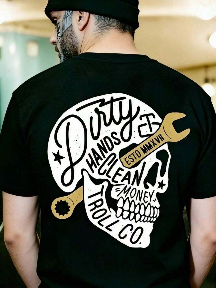 Camisetas Casuales Premium Unisex Lindas "Incluso Con Las Manos Sucias, Puedes Ganar Dinero Limpio" - Camiseta Unisex de Mecánico, con un Estampado de Ropa de Trabajo/Urbana en la Espalda y un Patrón de Calavera. - Negro - Ver 1