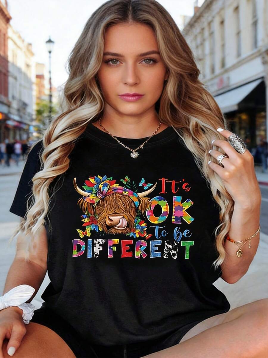 This Graphic Tee Is Unique And Distinctive: A Women's Tee With A Colorful Highland Cow Print, Adorned With Vibrant Floral And Butterfly Motifs, Perfect For Everyday Wear And Showcasing A Modern Personality. Its Unique Design Makes It An Excellent Gift For Friends And Family, Ideal For Casual Outings And Everyday Comfort. Cotton Tee. - 黑色 - 查看 1
